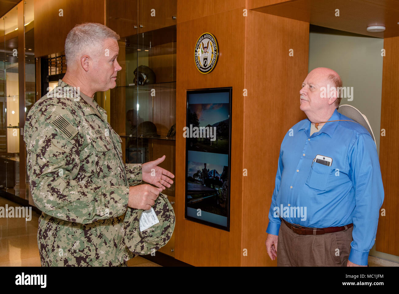 U.S. Navy Rear Adm. Jon Kreitz, right, Defense POW/MIA Accounting ...