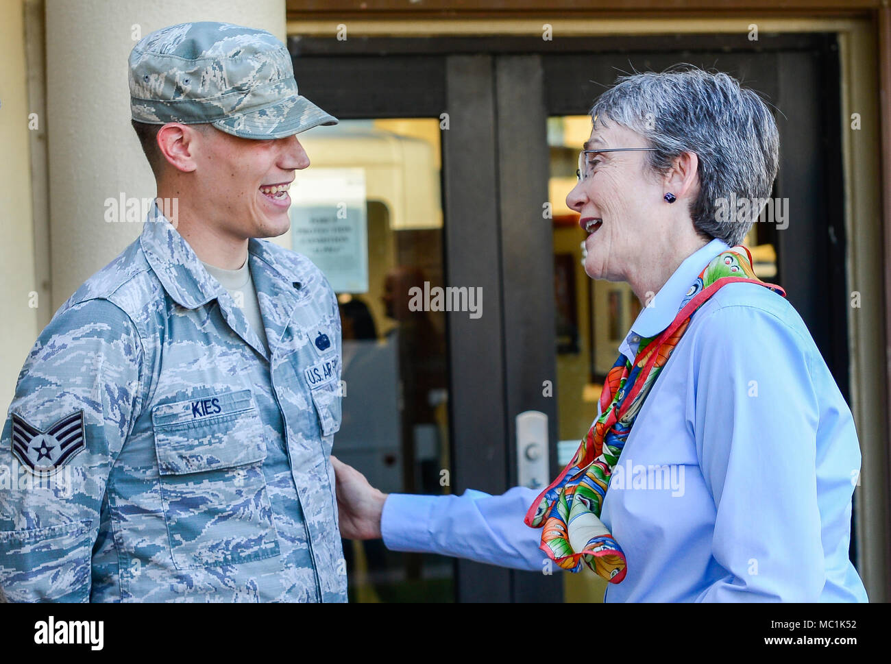 Secretary of the Air Force Heather Wilson speaks to Staff Sgt. Anthony Kies, 644th Combat Communications Squadron, during a base visit at Andersen Air Force Base, Guam, Jan. 25, 2018. During the tour, Wilson reiterated the importance of readiness, modernization and innovations to remain the greatest Air Force in the world. (U.S. Air Force photo by Airman 1st Class Christopher Quail) Stock Photo