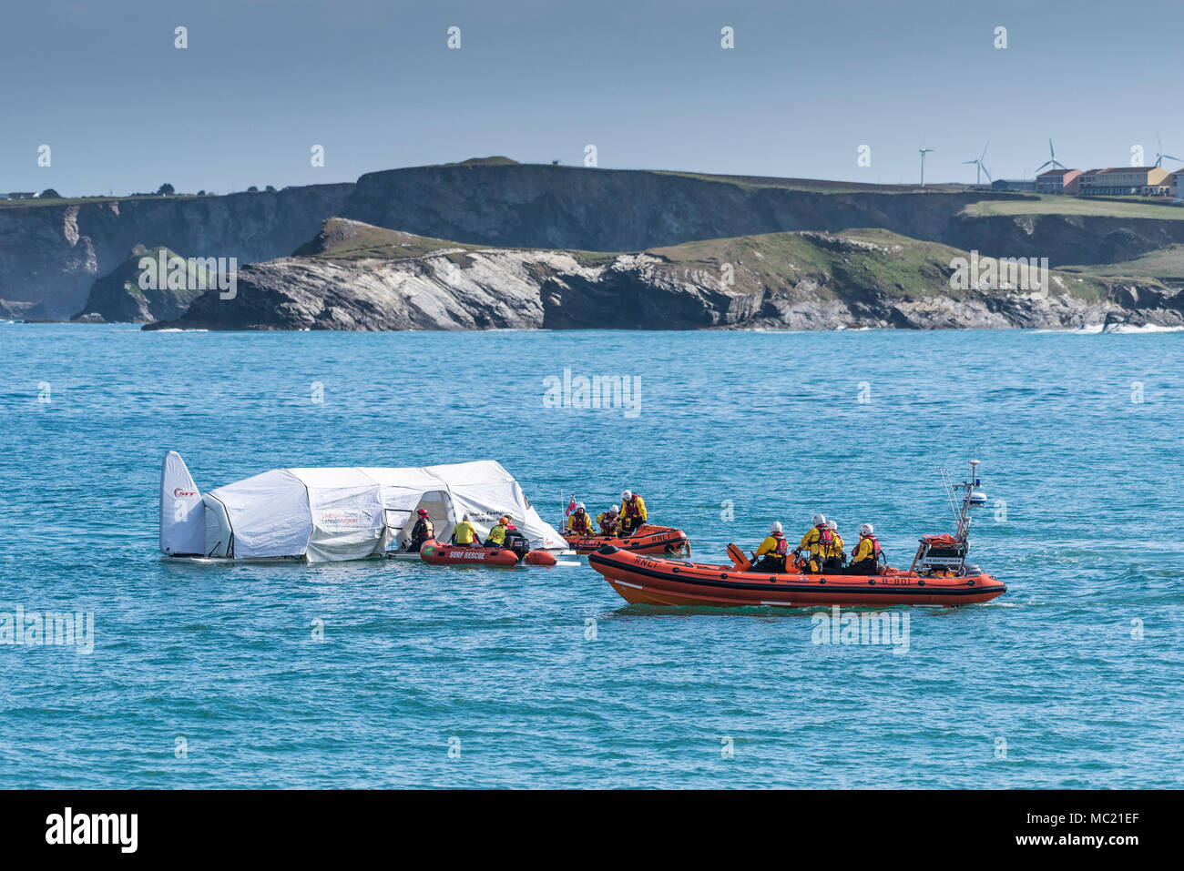 A Rescue and Firefighting Aircraft Simulator floating on the sea and being used in a GMICE (Good Medicine in Challenging Environments) major incident  Stock Photo