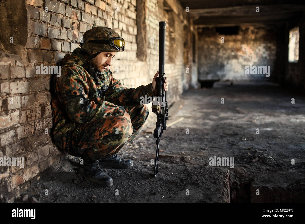 A thoughtful soldier, resting from a military operation Location of ...