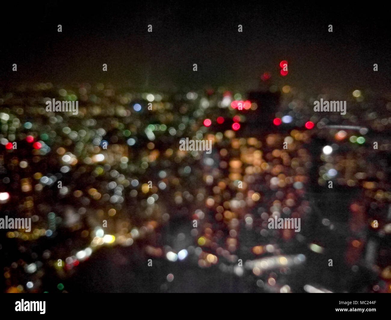 Defocused Stunning night light scene of Tokyo metropolis in Japan Stock Photo
