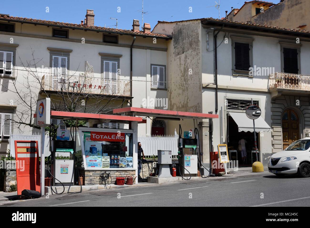 Totalerg - Total Petrol station Fiesole is a town on a scenic height above Florence, 8 kilometres (5 mi) northeast of that city. The Decameron by Giovanni Boccaccio is set in the slopes of Fiesole.Tuscany, Italy - Italian. Stock Photo