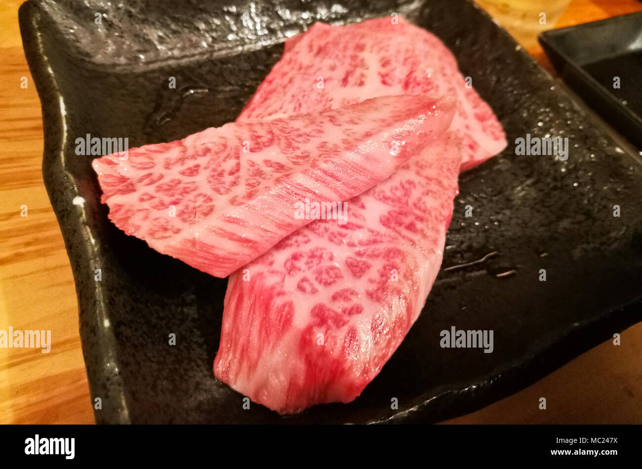 Mable premium grade Wagyu Japanese raw beef thick slice steak Stock Photo