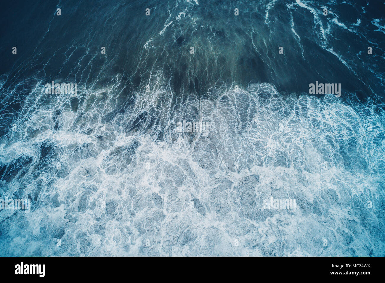 Aerial view of sea waves and rocky coast Stock Photo - Alamy