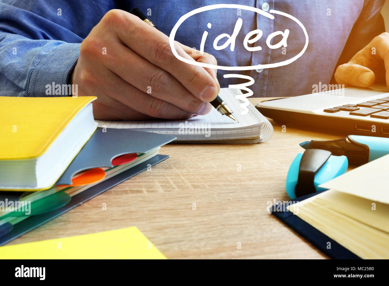 Man writing in the note. Creative idea concept. Stock Photo