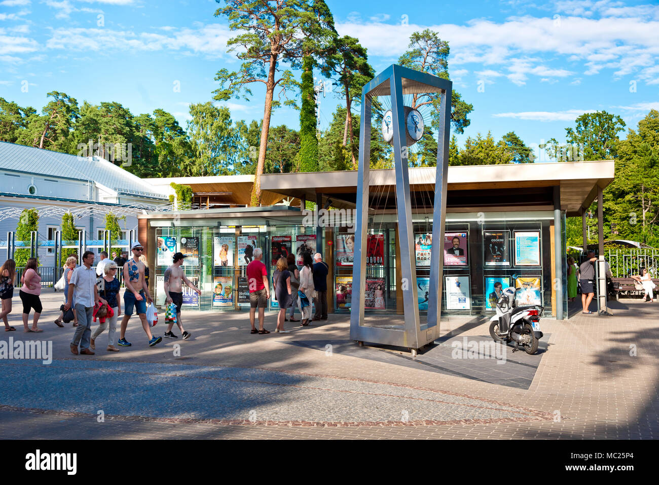 Many tourists on the street, the concert hall "Dzintari» in Jurmala ...