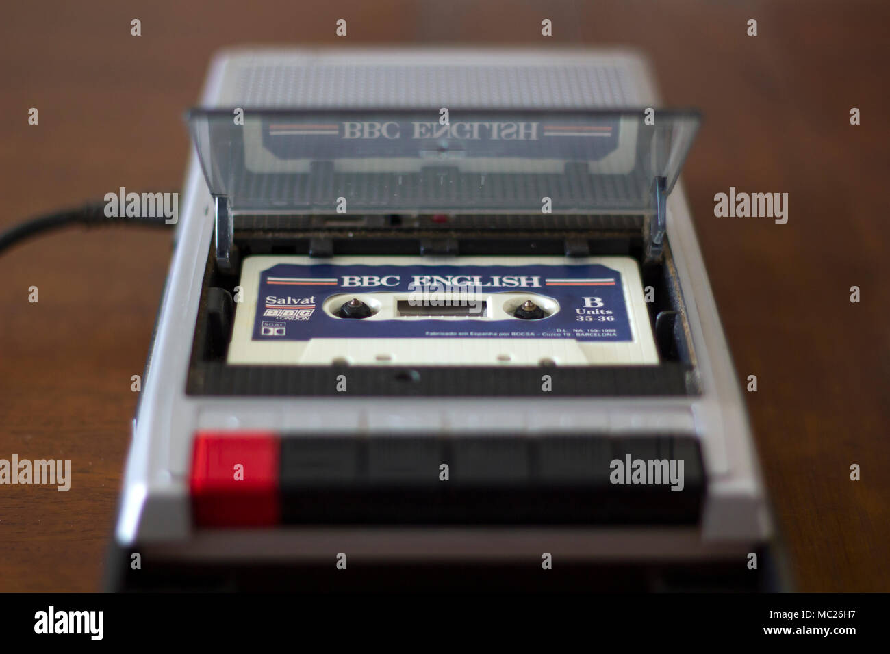 Vintage cassette tape player with english lessons cassette tape inside