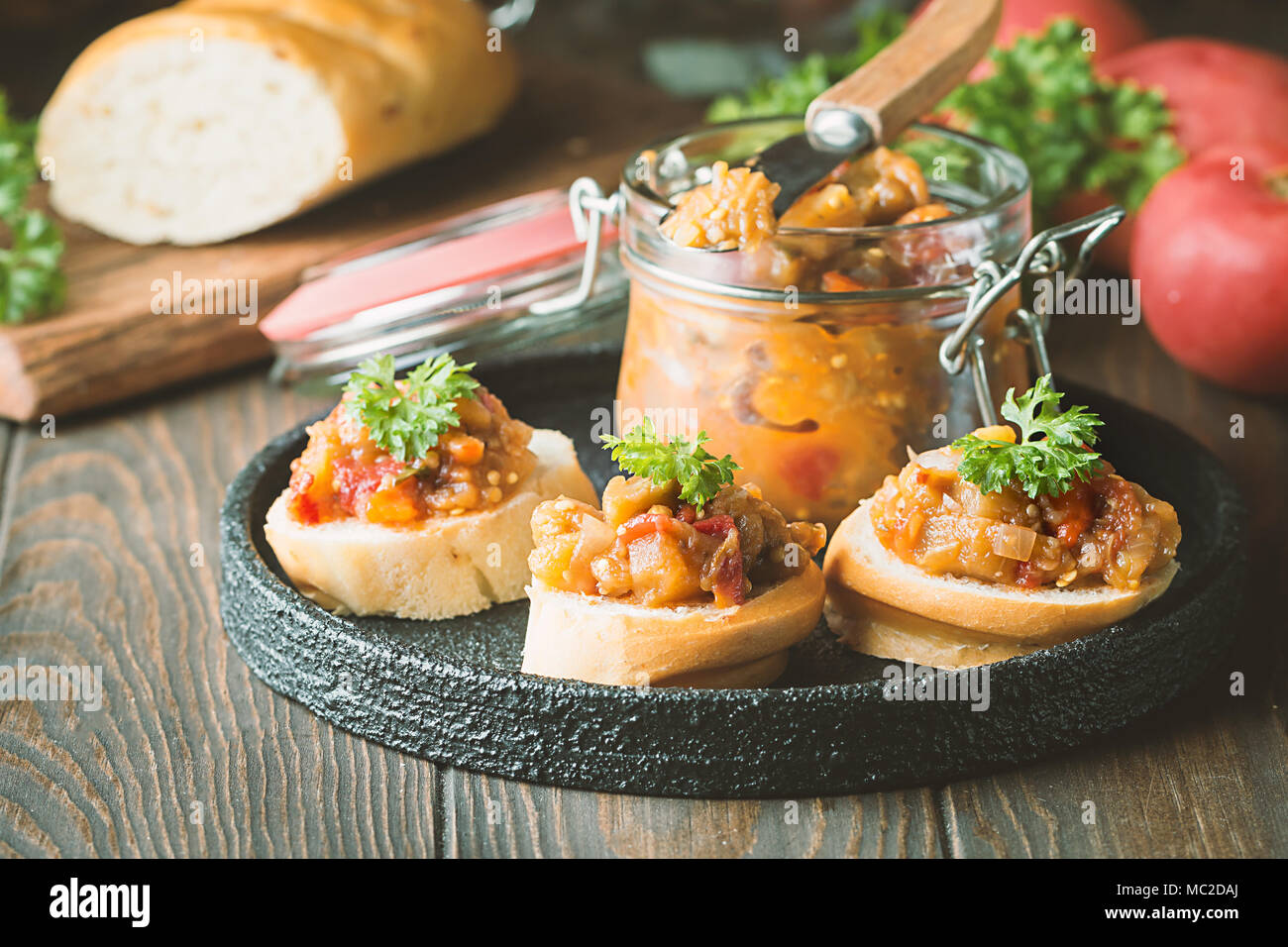 Bread toasts with eggplant caviar. Vegetable appetizer or antipasti