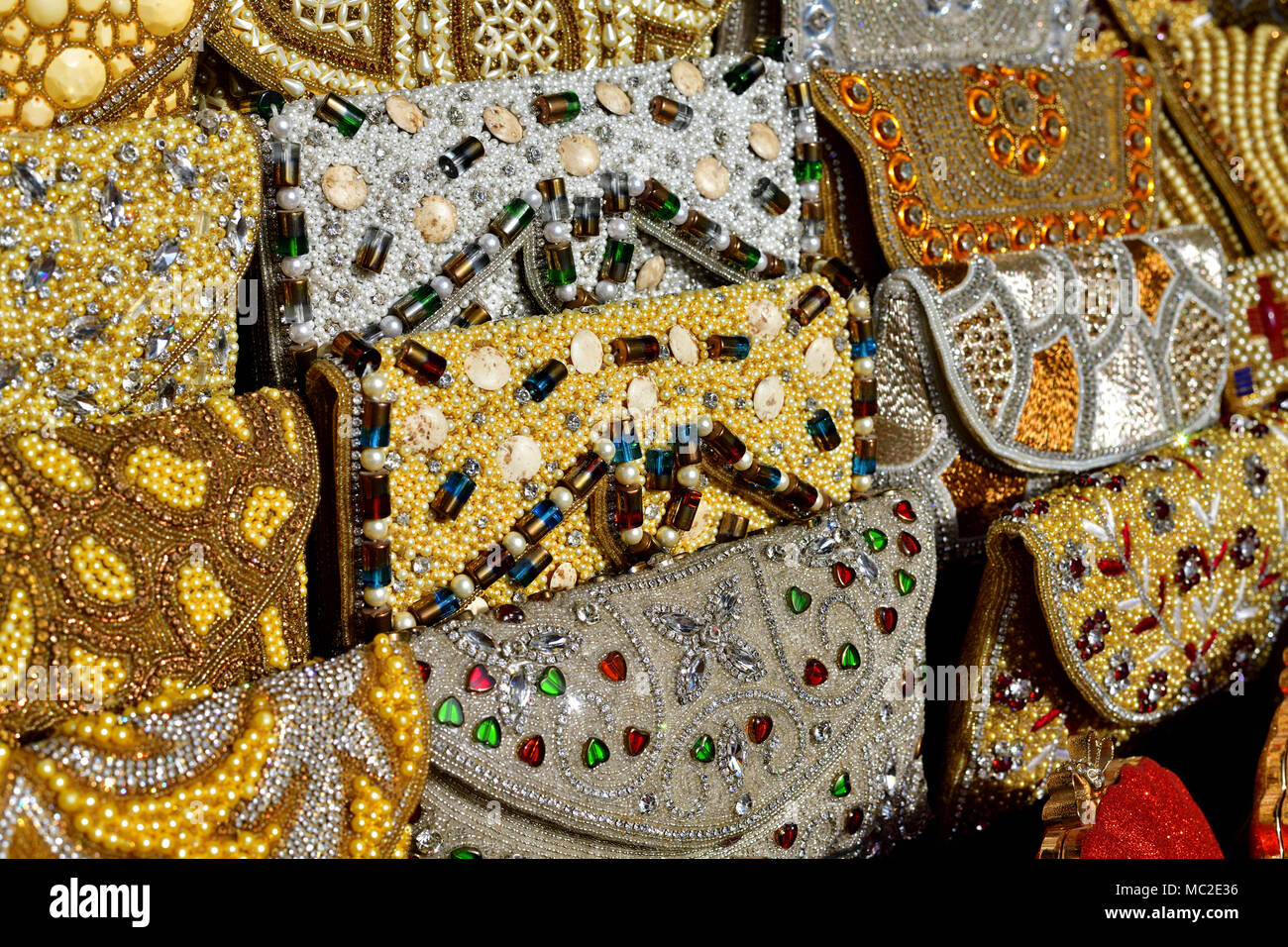 women's handbag decorated with semiprecious stones and beads on market in UAE Stock Photo