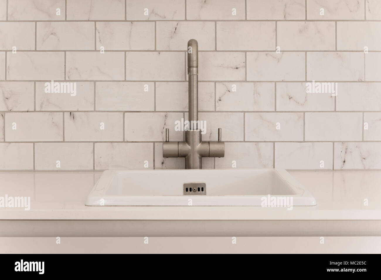 Modern kitchen interior showing worktop and sink Stock Photo - Alamy