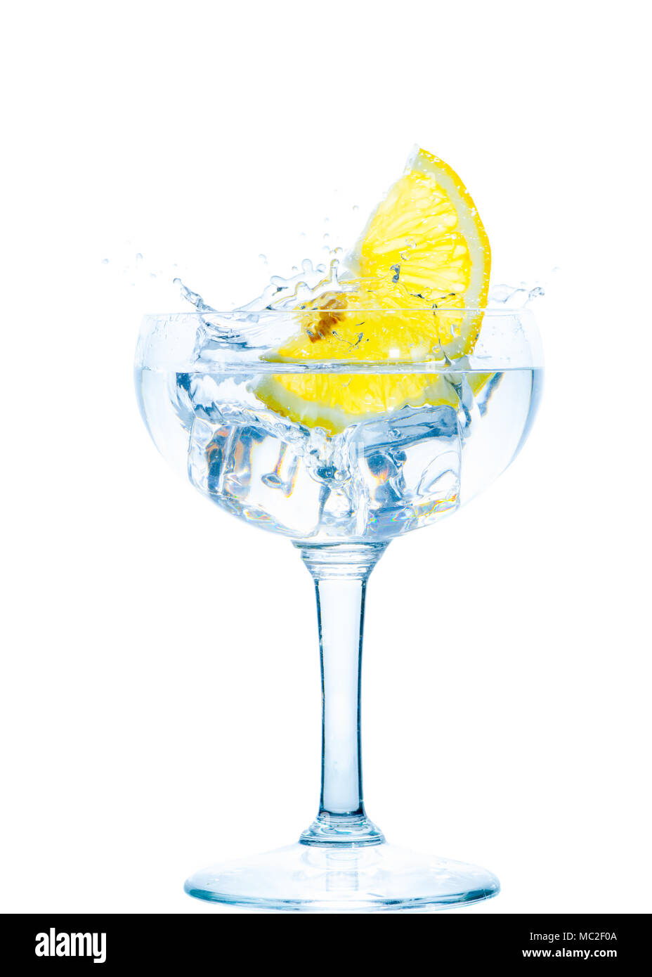 ice cube splash with lemon isolated on white background Stock Photo - Alamy