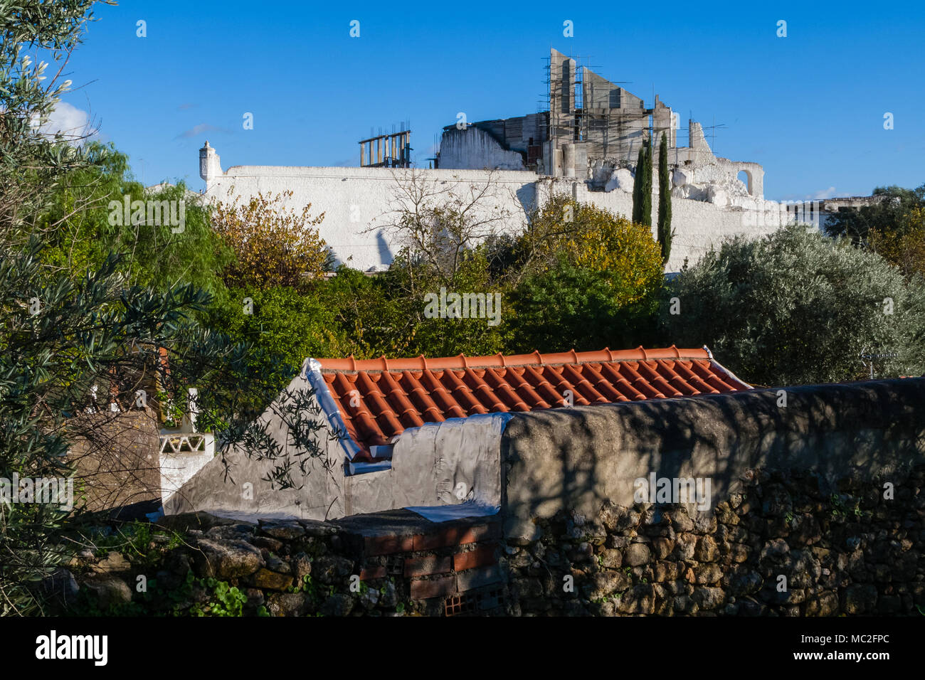 Crato Castle ruins in Crato, Portugal. Destroyed in battle. Belonged to the Hospitaller Crusader Knights aka Malta Order. Being rebuilt by a private w Stock Photo