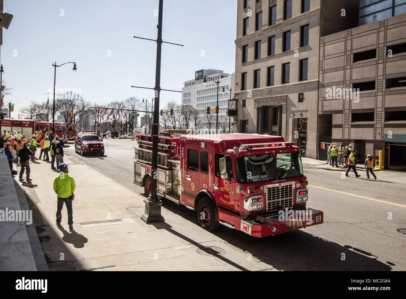 Detroit Fire Department truck parked on the city streets of downtown Detroit Michigan while responding to a call. Detroit is Michigan's largest city. Stock Photo