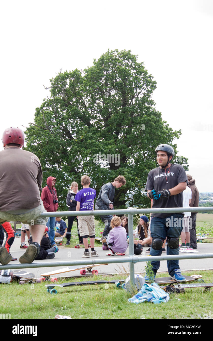 Skateboarders hanging out warming up at longboard event Stock Photo Alamy