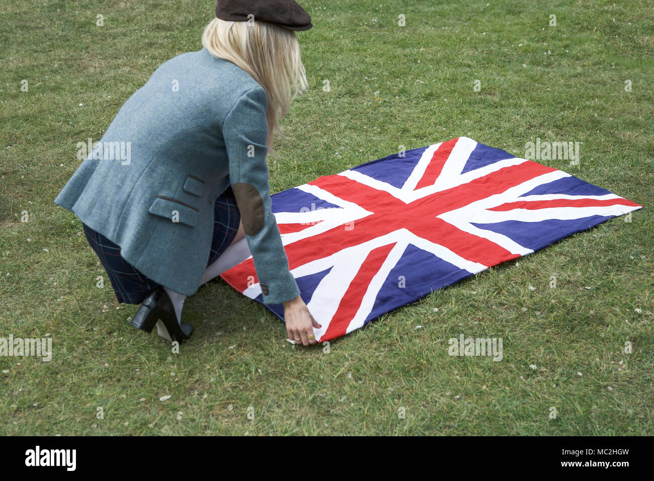 Britishness. British symbols: Union Jack Towel. British country clothing: Tweed Jacket. British democracy. Brexit Stock Photo