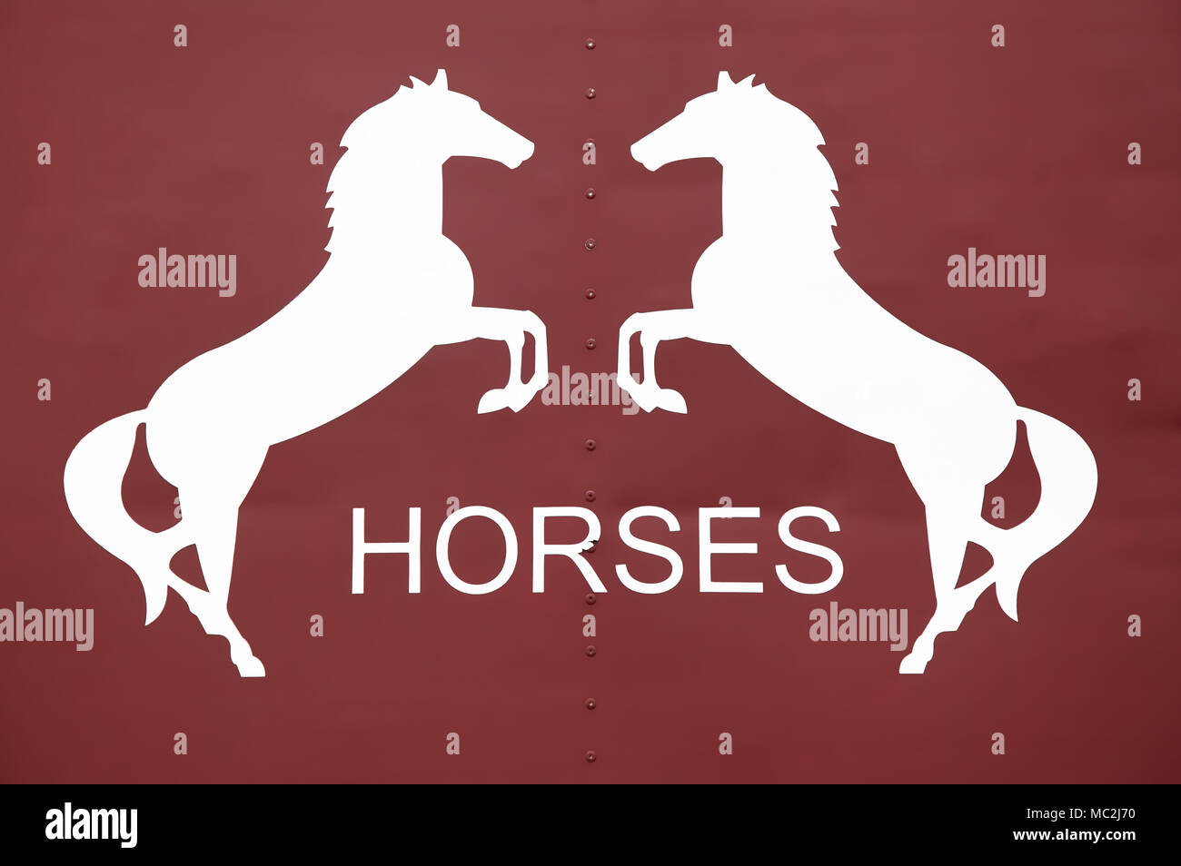 Rearing horses text sign signage or labels Stock Photo - Alamy