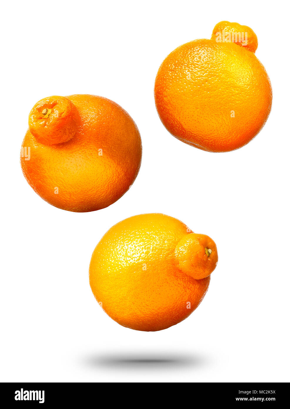 Falling mandarins or tangerines citrus fruit Stock Photo
