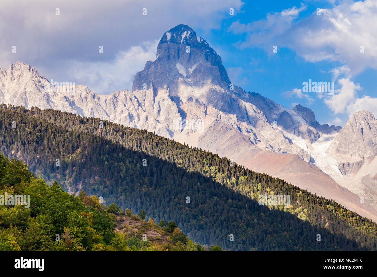 Ushba is one of the most notable peaks of the Caucasus Mountains. It is  located in the Svaneti region of Georgia Stock Photo - Alamy, image size:1300x956
