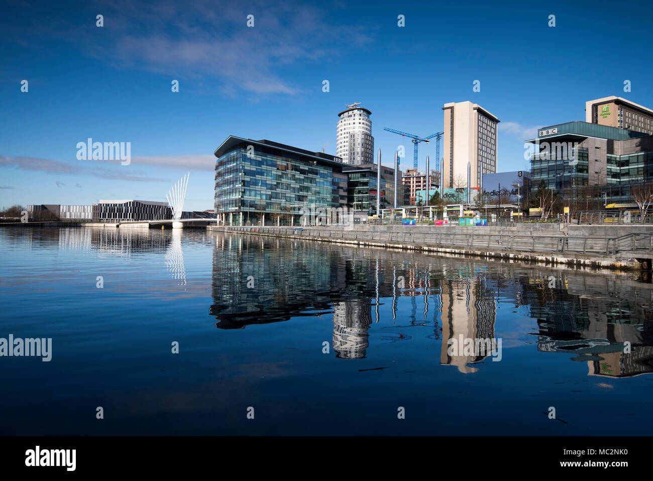 Early morning reflection of Media City at Salford Quays, Greater Manchester England UK Stock Photo
