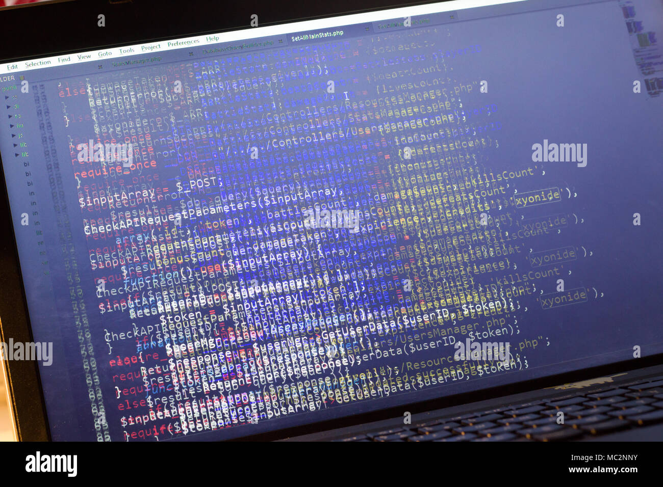 PHP back-end code. Computer programming source code. Abstract screen of web developer. Digital technology modern background. Code is created by mysel Stock Photo