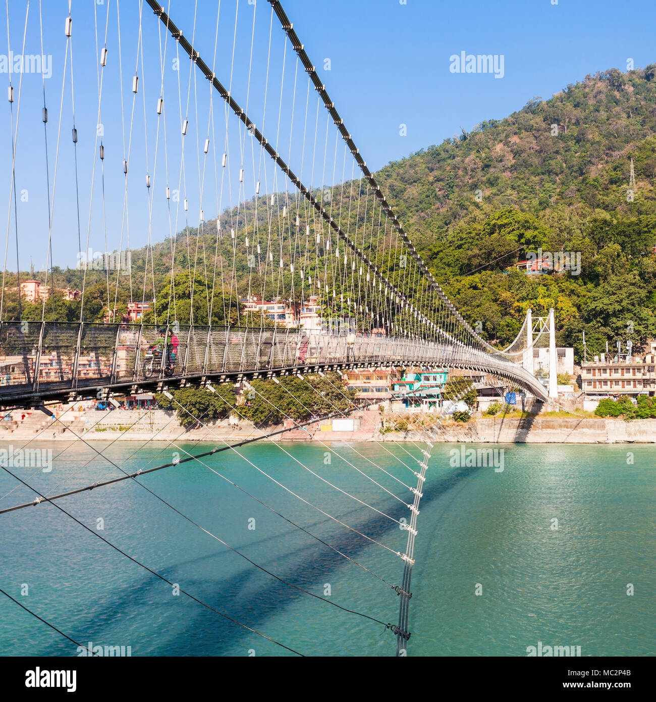 Ram Jhula is an iron suspension bridge situated in Rishikesh, Uttarakhand state of India Stock Photo Alamy