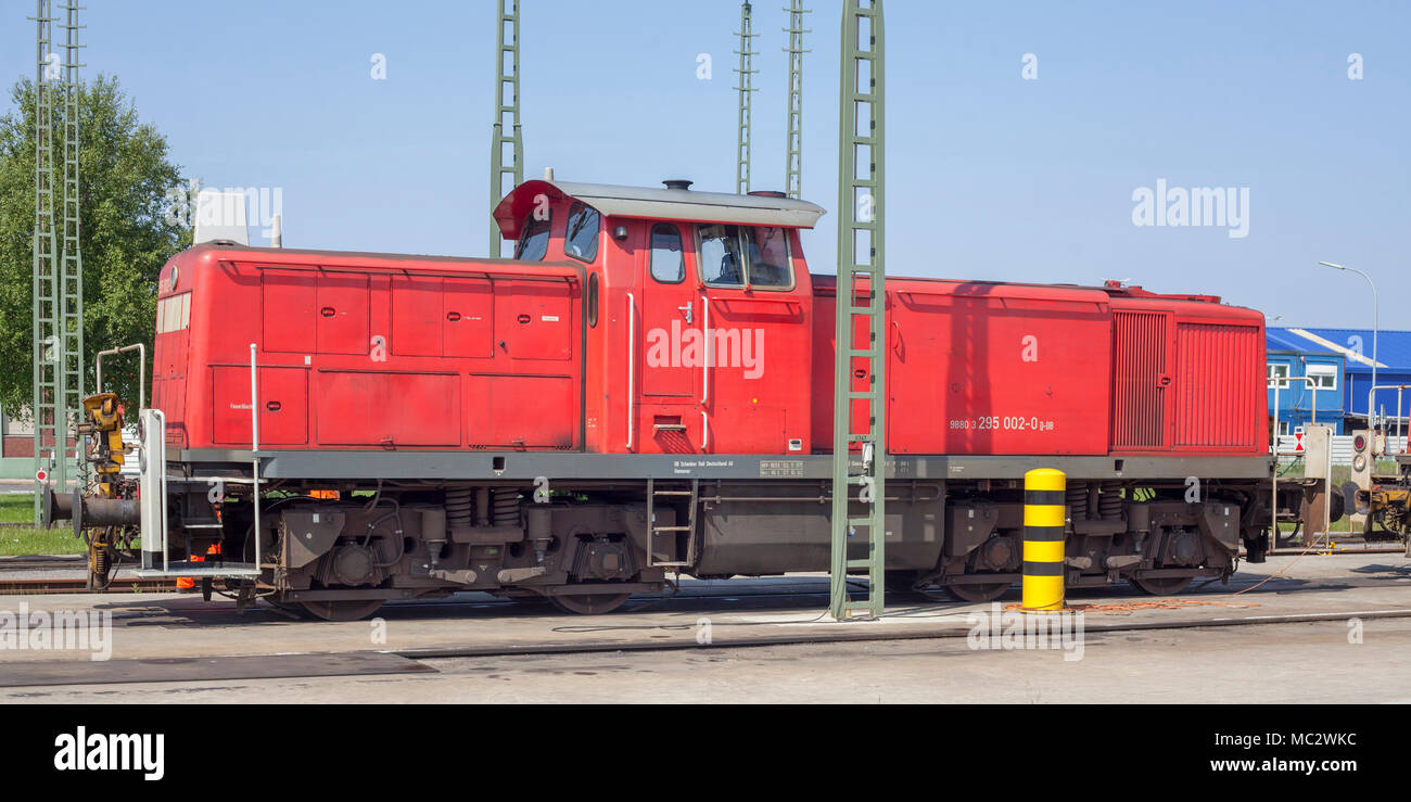 Red Diesel locomotive in harbor, Bremerhaven, Germany, Europe  I  Rote Diesellokomotive im Hafen, Bremerhaven, Bremen, Deutschland Stock Photo