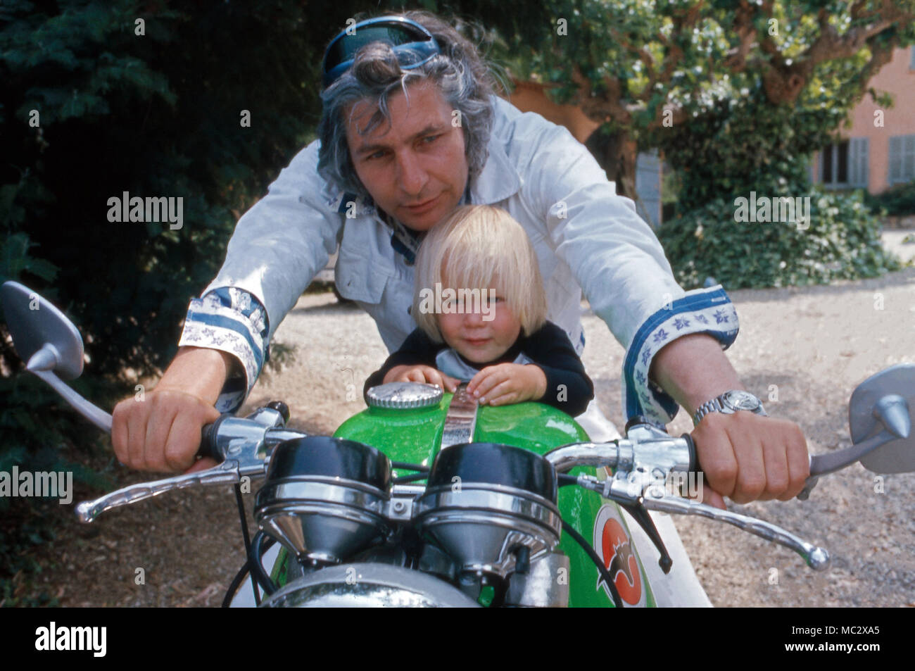Gunter Sachs auf dem Motorrad mit Sohn Christian Gunnar. Gunter and Christian Gunnar Sachs on a motorbike. Stock Photo