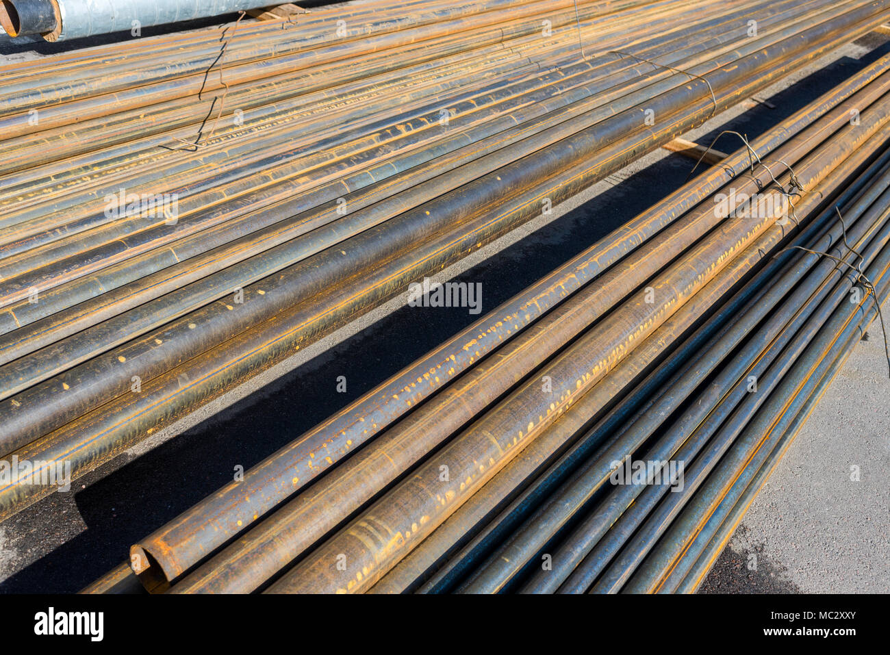 metal pipes horizontally Stock Photo Alamy