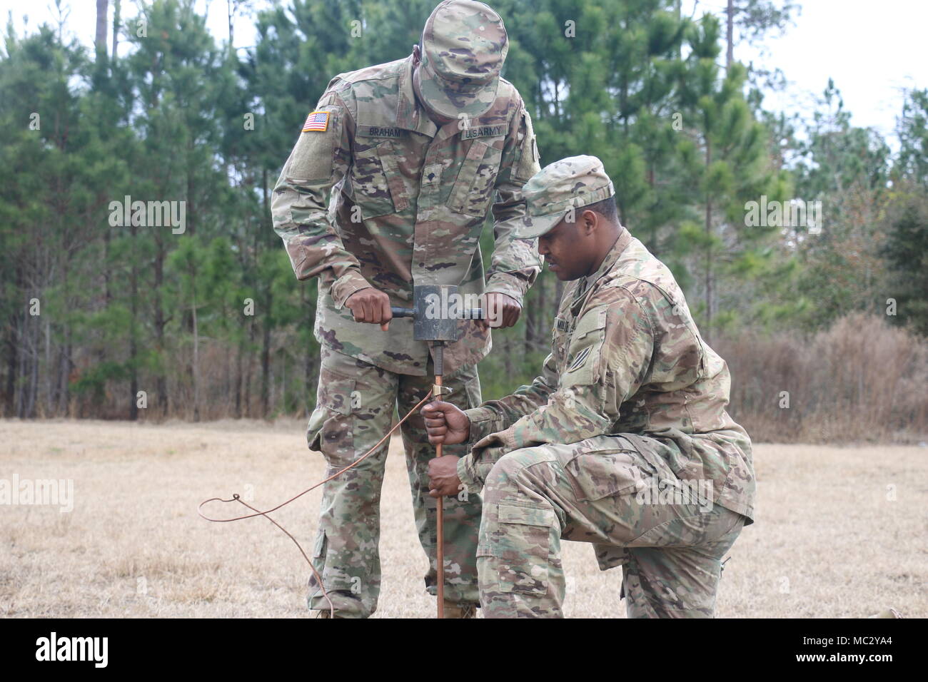 Spc. Kenyon Miller and Spc. Hoshaine Braham, Culinary Specialists assigned  to E Company, 9th Brigade Engineer Battalion, 2nd Armored Brigade Combat  Team, 3rd Infantry Division, prepare to ground an Assault Kitchen during