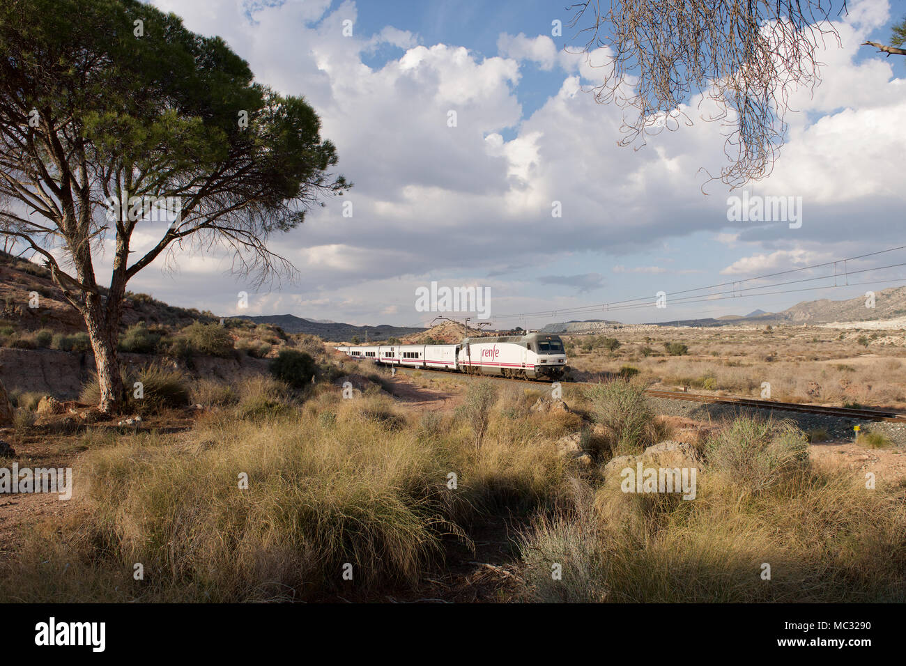 Renfe passenger train in the countryside of Spain Stock Photo