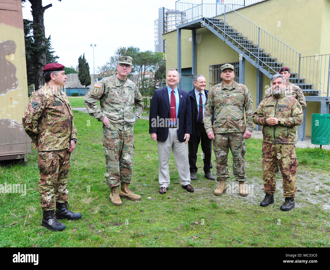 (From left) 1 Mar LGT Giuseppe Tringale, Folgore (ABN) Brigade Headquarters Plans Noncommissioned Officer, Sgt. Maj. Anthony R. Valdez, 7 Army Training Command G-3 Sergeant Major, James V. Matheson, Chief Regional Training Support Division South, 7th Army Training Command, Ivano Trevisanutto, Chief Training Support Center Italy, 7th Army Training Command, Lt. Col. Ismael B. Natividad, Training Support Activity Europe (TSAE) Director, Col. Marco Becherini, Folgore (ABN) Brigade Training Center Commander, visit Lustrissimi Training Area, Livorno, Italy, Jan 30, 2018.(photo by Vincenzo Vitiello/r Stock Photo