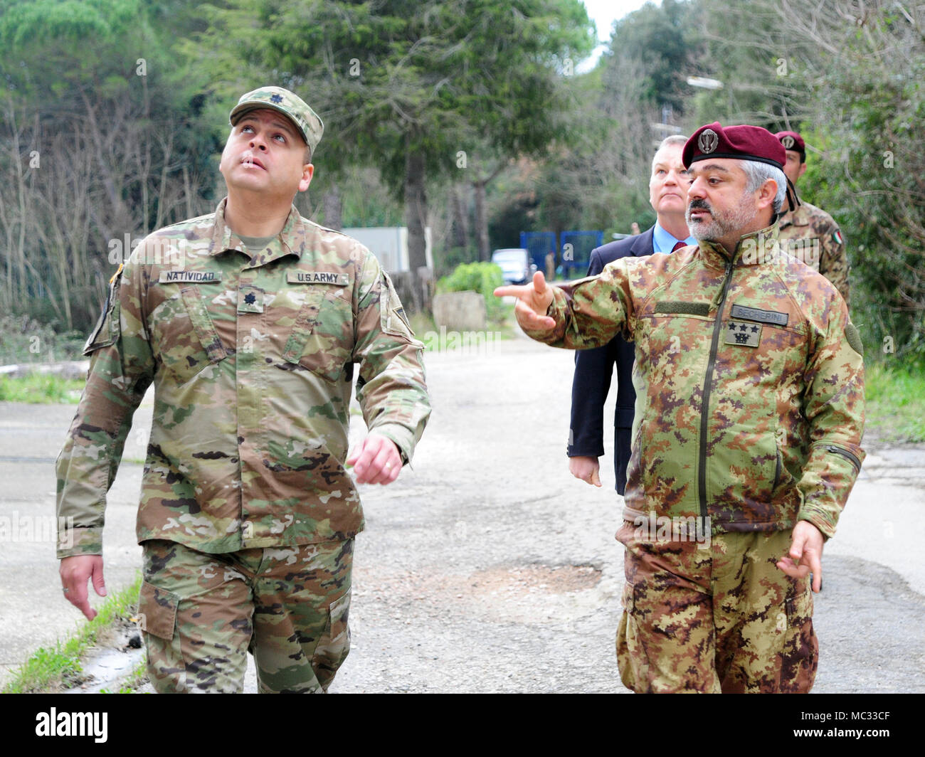 U.S. Army Lt. Col.LTC Ismael B. Natividad, Training Support Activity Europe (TSAE) Director, listens to Italian Army Col. Marco Becherini, Folgore (ABN) Brigade Training Center Commander during the TSAE Director visit at Valle Ugione Training Area, Livorno, Italy, Jan 30, 2018.(photo by Vincenzo Vitiello/released). Stock Photo