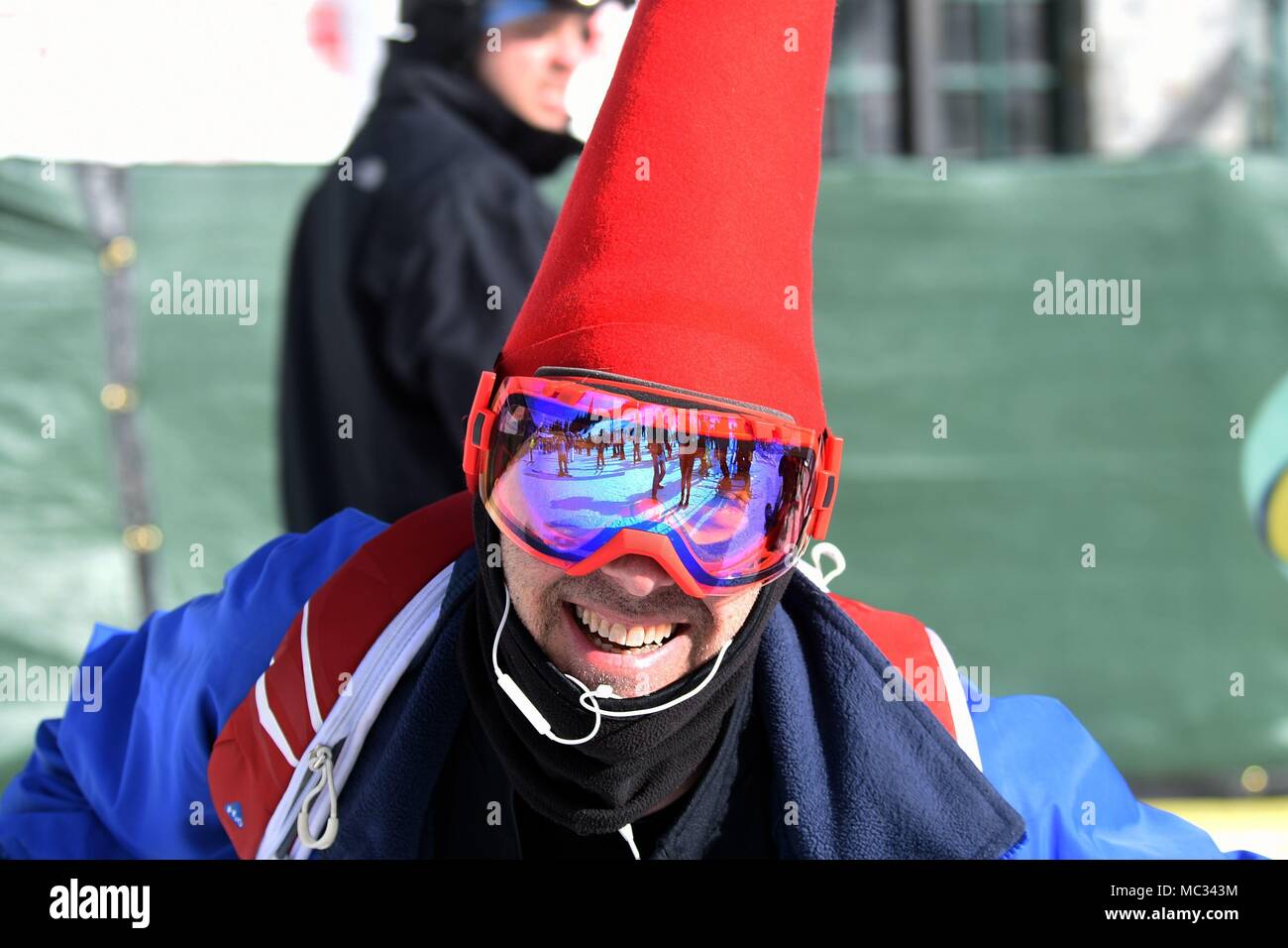 A SnoFest participant shows off his gear at the annual SnoFest at Copper Mountain, Colorado, Jan. 20, 2018. Skiers wore various accessories to help them stand out on the slopes. (U.S. Air Force photo by Airman 1st Class William Tracy) Stock Photo