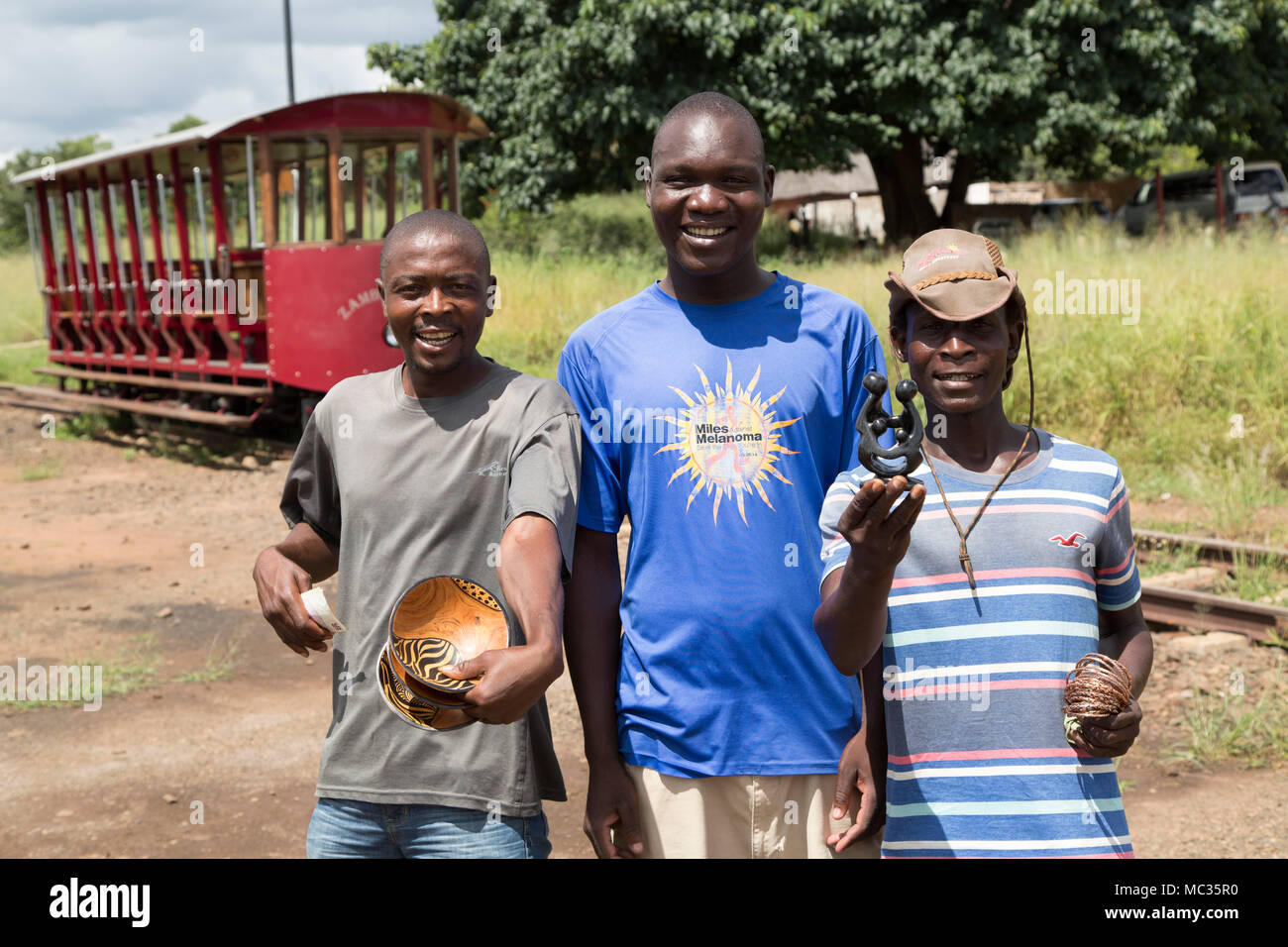 Souvenir sellers by the Zambezi Tram at Victoria Falls in Zimbabwe. Stock Photo