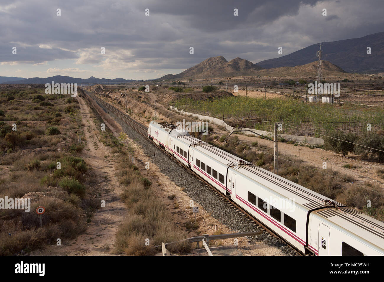 Renfe passenger train in the countryside of Spain Stock Photo - Alamy