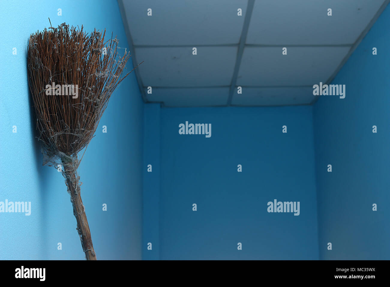 Cobweb Broom Leaning Against A Wall A Ceiling Background Stock Photo Alamy