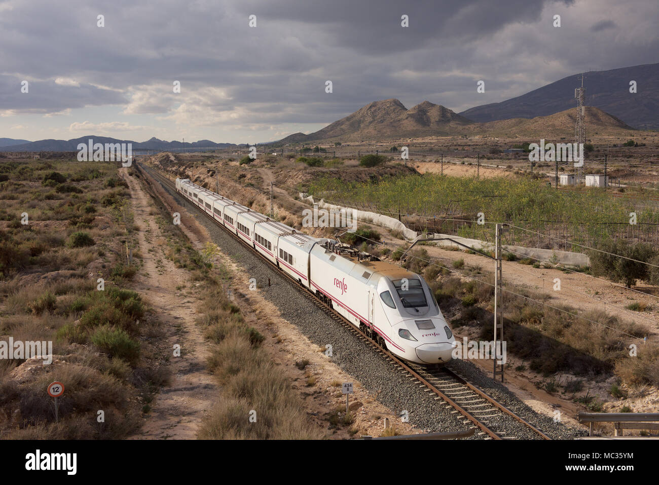 Renfe passenger train in the countryside of Spain Stock Photo - Alamy