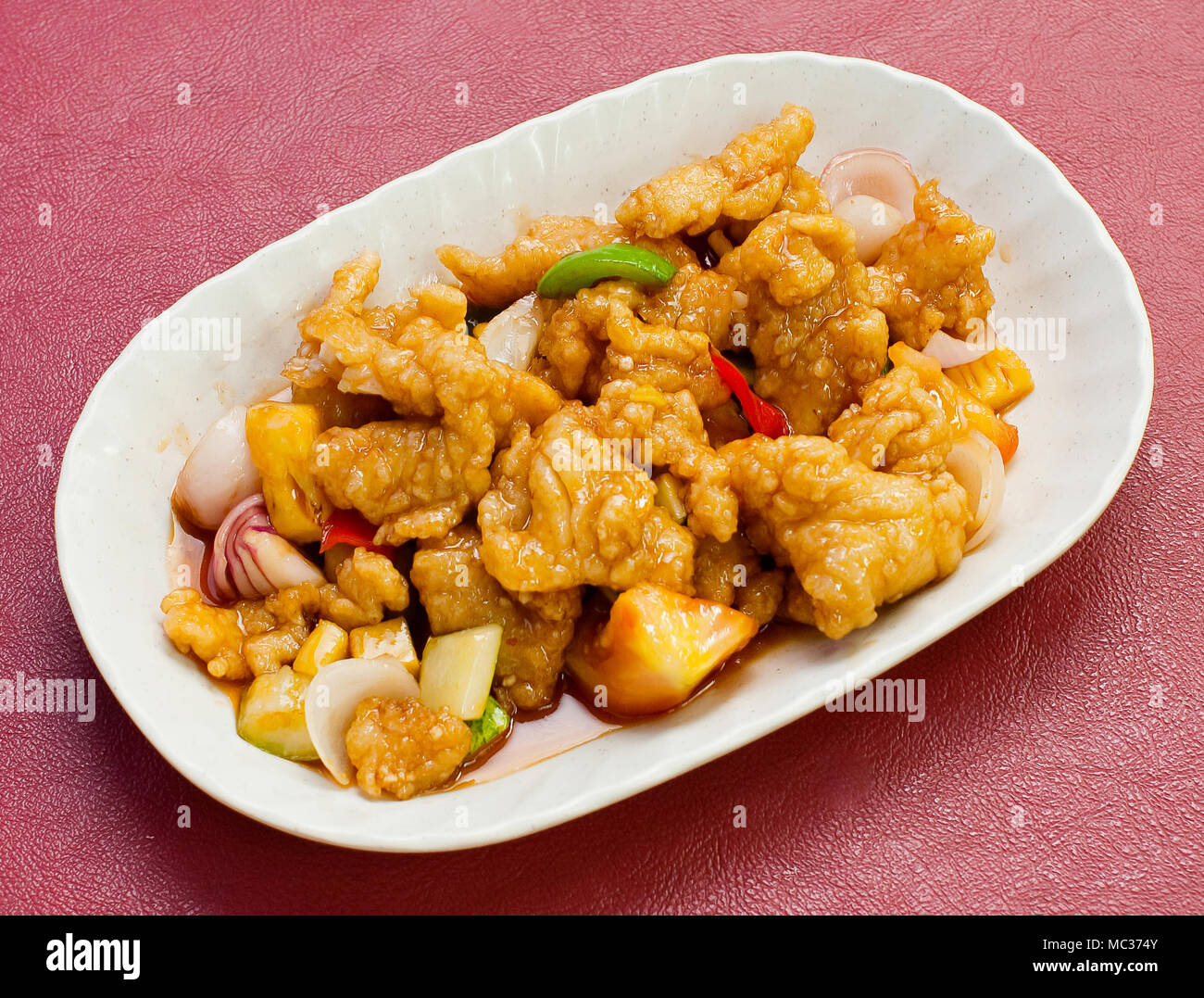 fish. Stir-fried fish with vegetables Stock Photo - Alamy