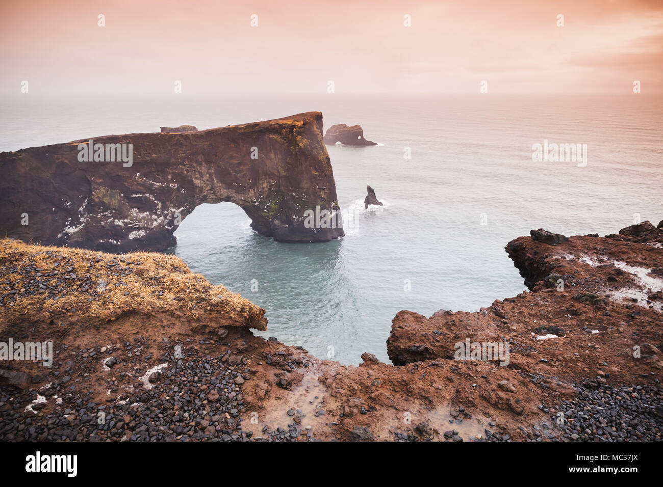 Scenic landscape with natural stone arch. Dyrholaey Nature Reserve, south coast of Iceland, Europe Stock Photo
