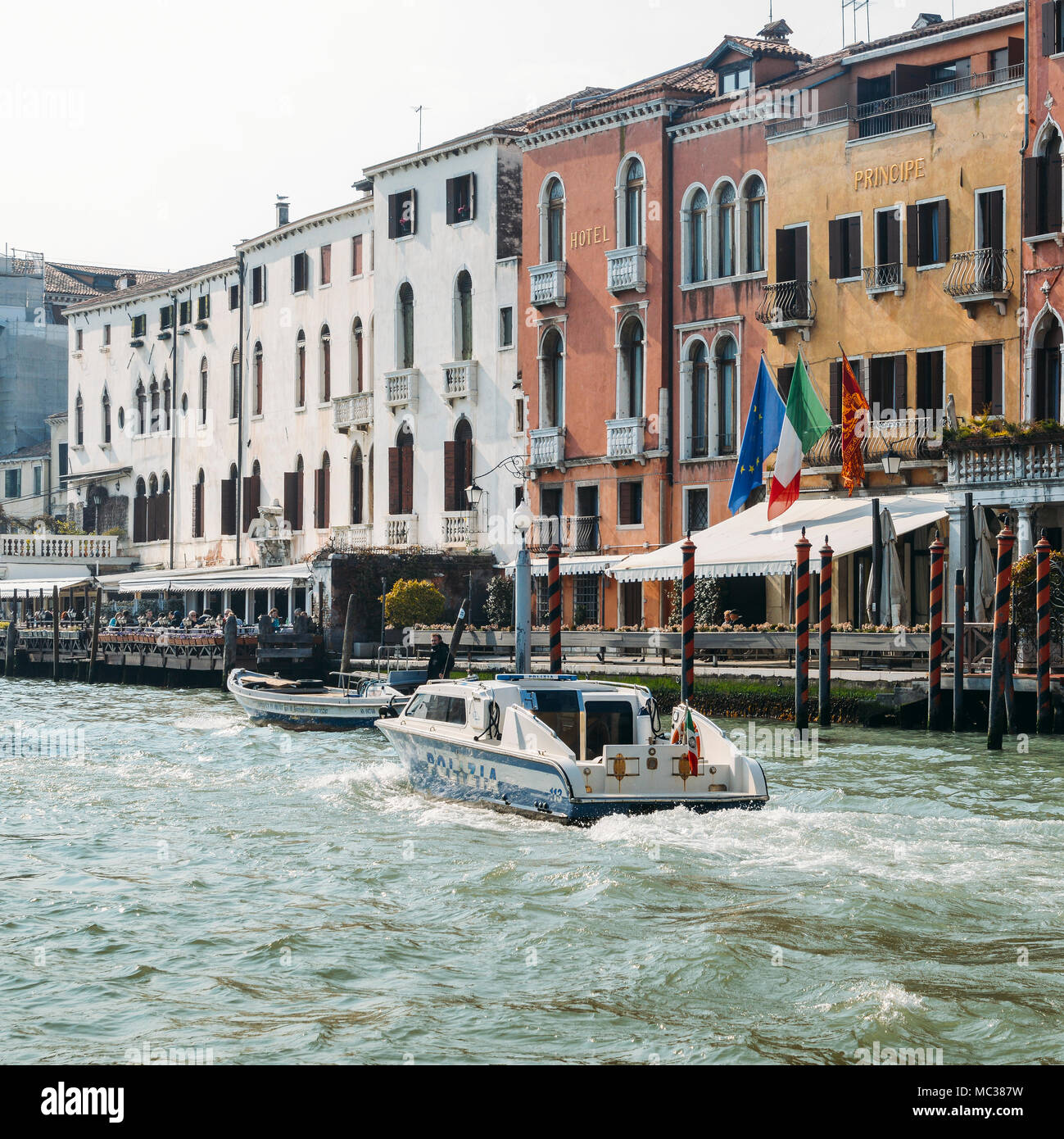 A police boat on the Grand canal in Venice Stock Photo
