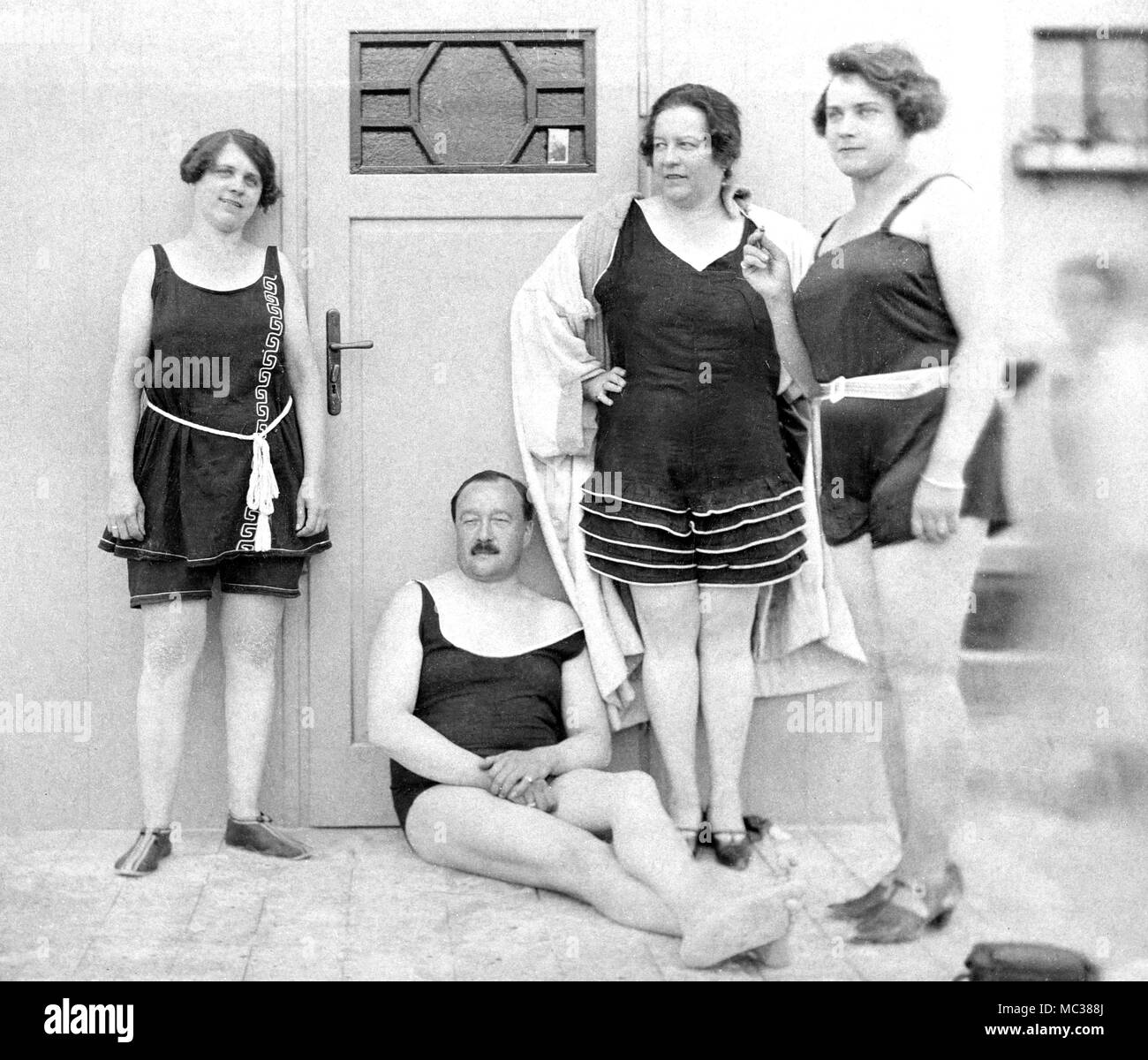German bathers relax at the changing house at the beach, ca. 1928 Stock