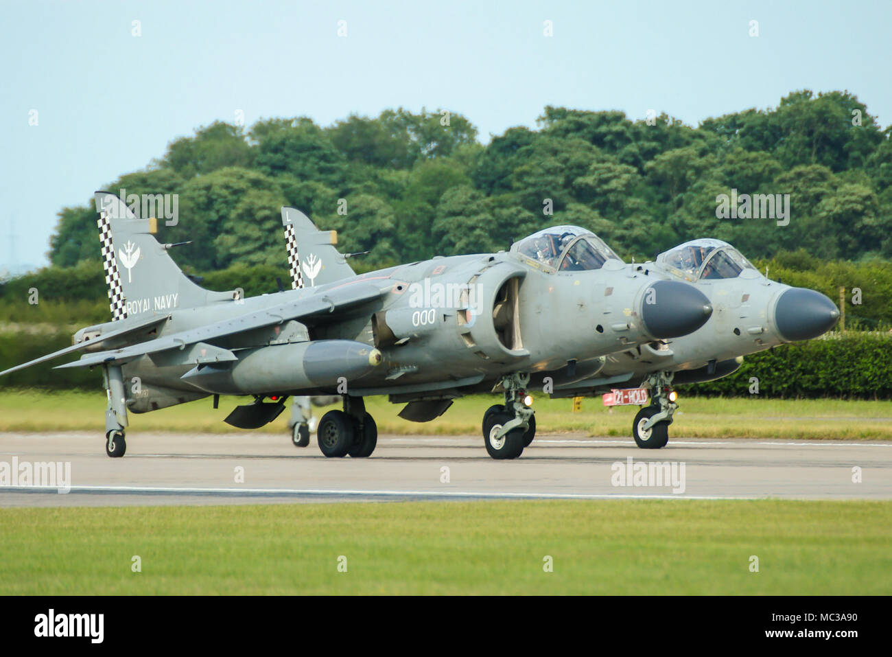 Royal Navy Fleet Air Arm BAe British Aerospace Sea Harrier F/A2 FRS2 pair vertical take off and landing jet fighter. Jump jet Stock Photo