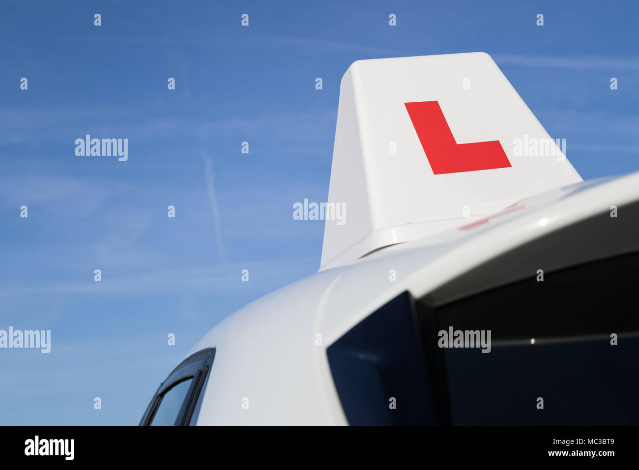 British driving school car roof sign Stock Photo