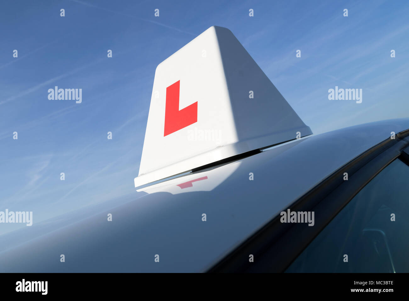 British driving school car roof sign Stock Photo