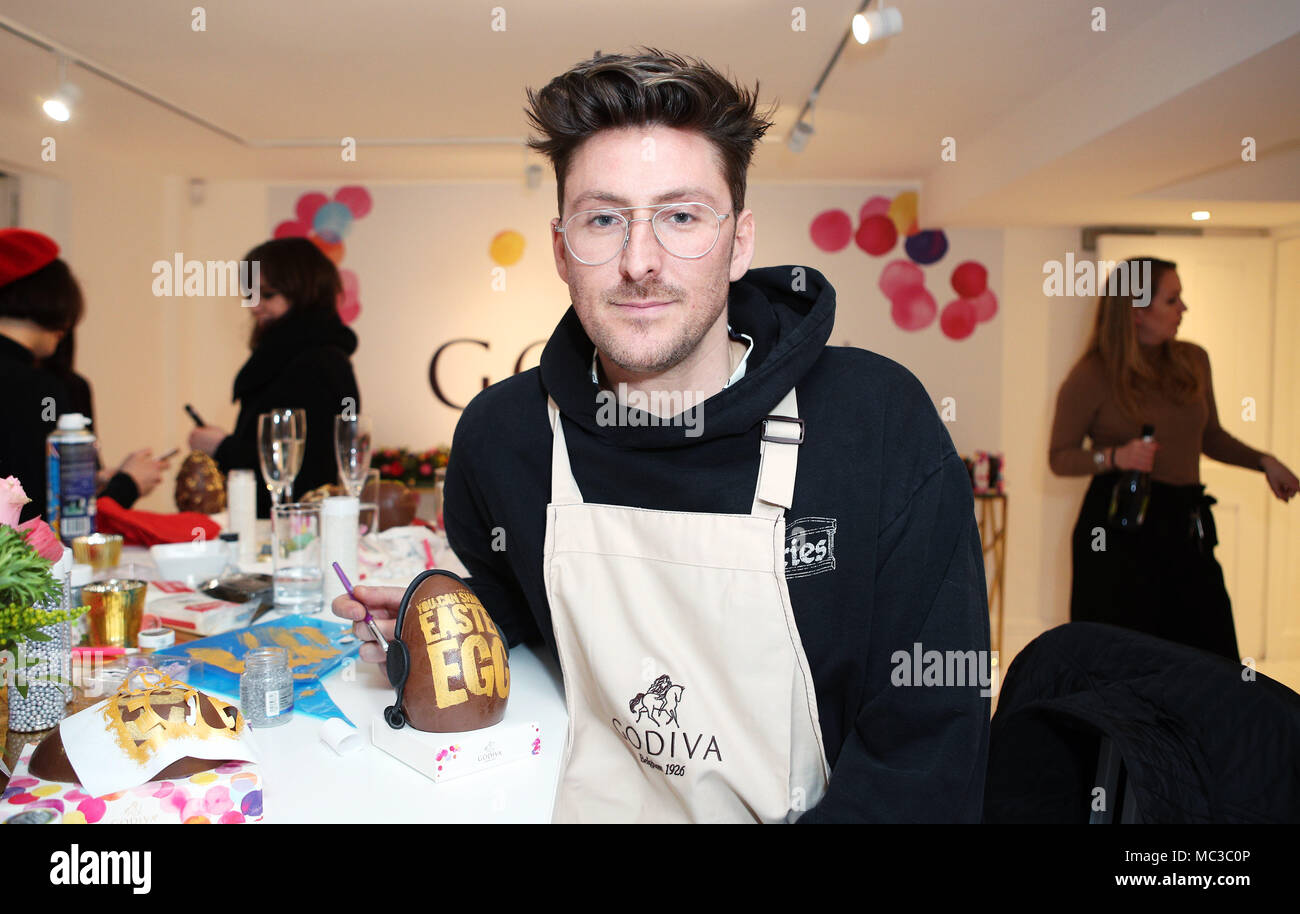 To mark the launch of its Spring Collection in Sainsbury’s stores, Luxury chocolatier Godiva tonight partnered with a host of famous faces, including designer Henry Holland, GBBO winner Candice Brown, and jewellery designer and former Made In Chelsea star Rosie Fortescue to create a selection of bespoke luxury Easter eggs. All of the eggs created are set to be given away via Godiva’s social channels in the lead up to Easter. - Henry Holland  Featuring: Henry Holland Where: London, United Kingdom When: 12 Mar 2018 Credit: Joe Pepler/PinPep/WENN.com Stock Photo