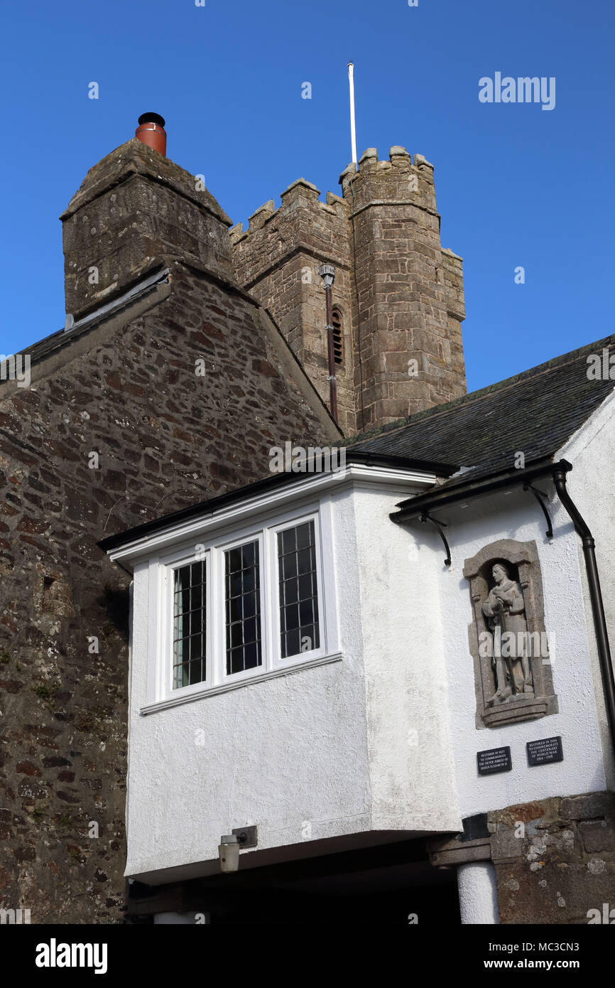 The old school house above the entrance to St Michael's church, Ilsington, Devon, UK. Stock Photo