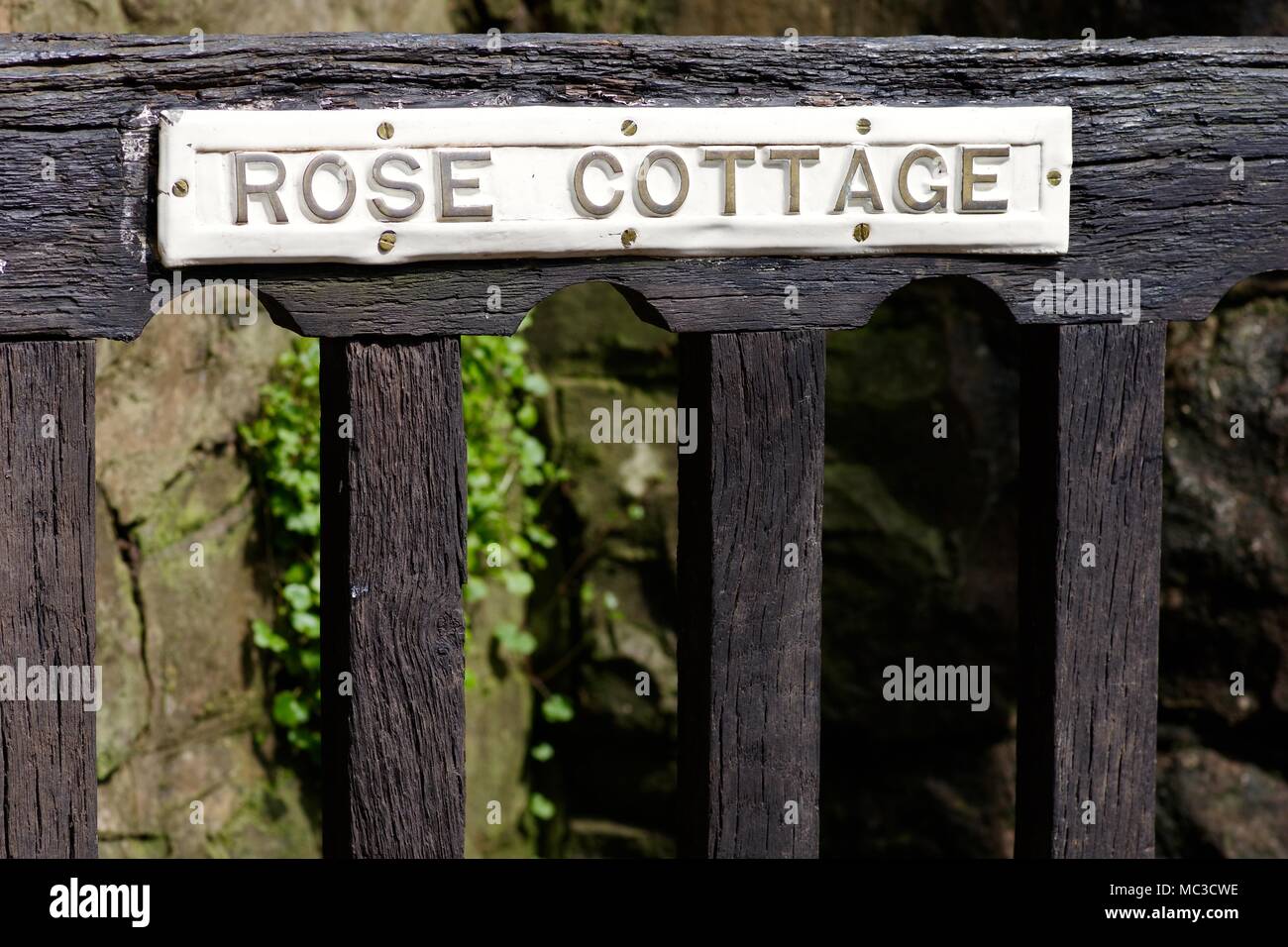 Rose Cottage House Name Plaque on an Old Rustic Wooden Gate. Bickleigh, Tiverton, Devon, UK