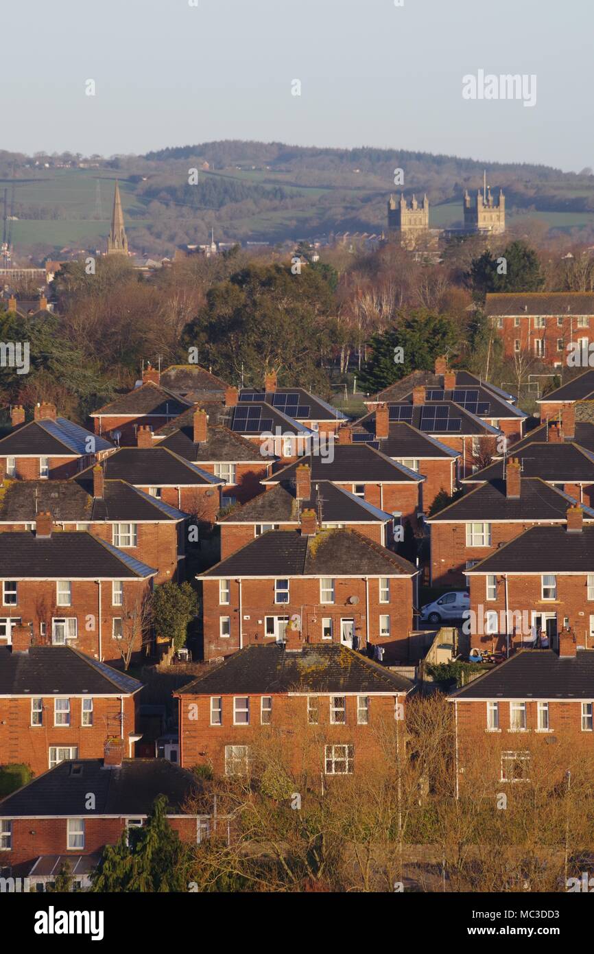 Burnthouse Lane, 1930's Council Estate, of Square Brick Houses. Exeter Cathedral in Distance. Exeter, Devon, UK. Stock Photo
