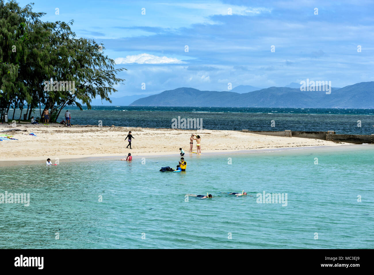 Tourists on the beach at Green Island, Great Barrier Reef Marine National Park, Far North Queensland, QLD, FNQ, GBR, Australia Stock Photo