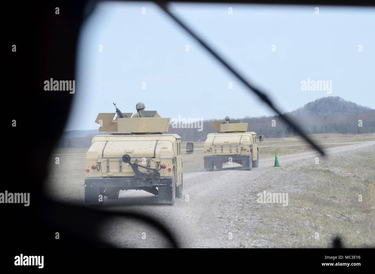 U.S. Army Reserve Soldiers move into engagement zones in convoy live-fire escort team qualification during Operation Cold Steel II hosted by the 377th Theater Sustainment Command at Ft. Knox, Ky., March 23, 2018. Operation Cold Steel is the U.S. Army Reserve’s crew-served weapons qualification and validation exercise to ensure America’s Army Reserve units and Soldiers are trained and ready to deploy on short-notice and bring combat-ready and lethal firepower in support of the Army and our joint partners anywhere in the world. Stock Photo